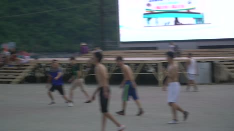 Men-Playing-Soccer-in-Street-4
