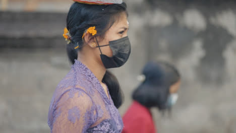 Tracking-Shot-of-a-Woman-Carrying-Things-Through-Bali