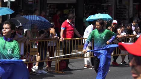 Young-Male-Students-Waving-Flags-in-Choreographed-Dance-During-Costa-Rican-Independence-Day-Parade