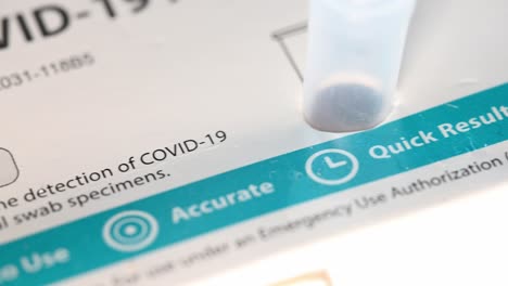 slow-macro-slide-over-a-home-test-kit-for-Covid-19
