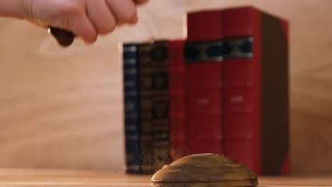 Close-up-of-judges-hand-with-gavel